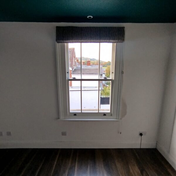 Timber sash window inside a period room, Dorking, Surrey