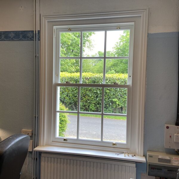 Inside view of a timber sash window with glazing bars, Woldingham, Surrey