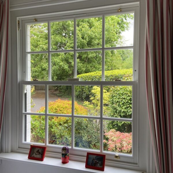 Timber box sash window overlooking the garden, Woldingham, Surrey